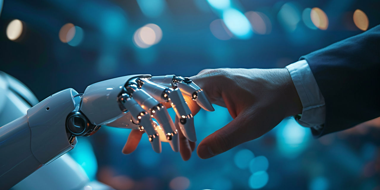 Eine Roboterhand berührt eine menschliche Hand