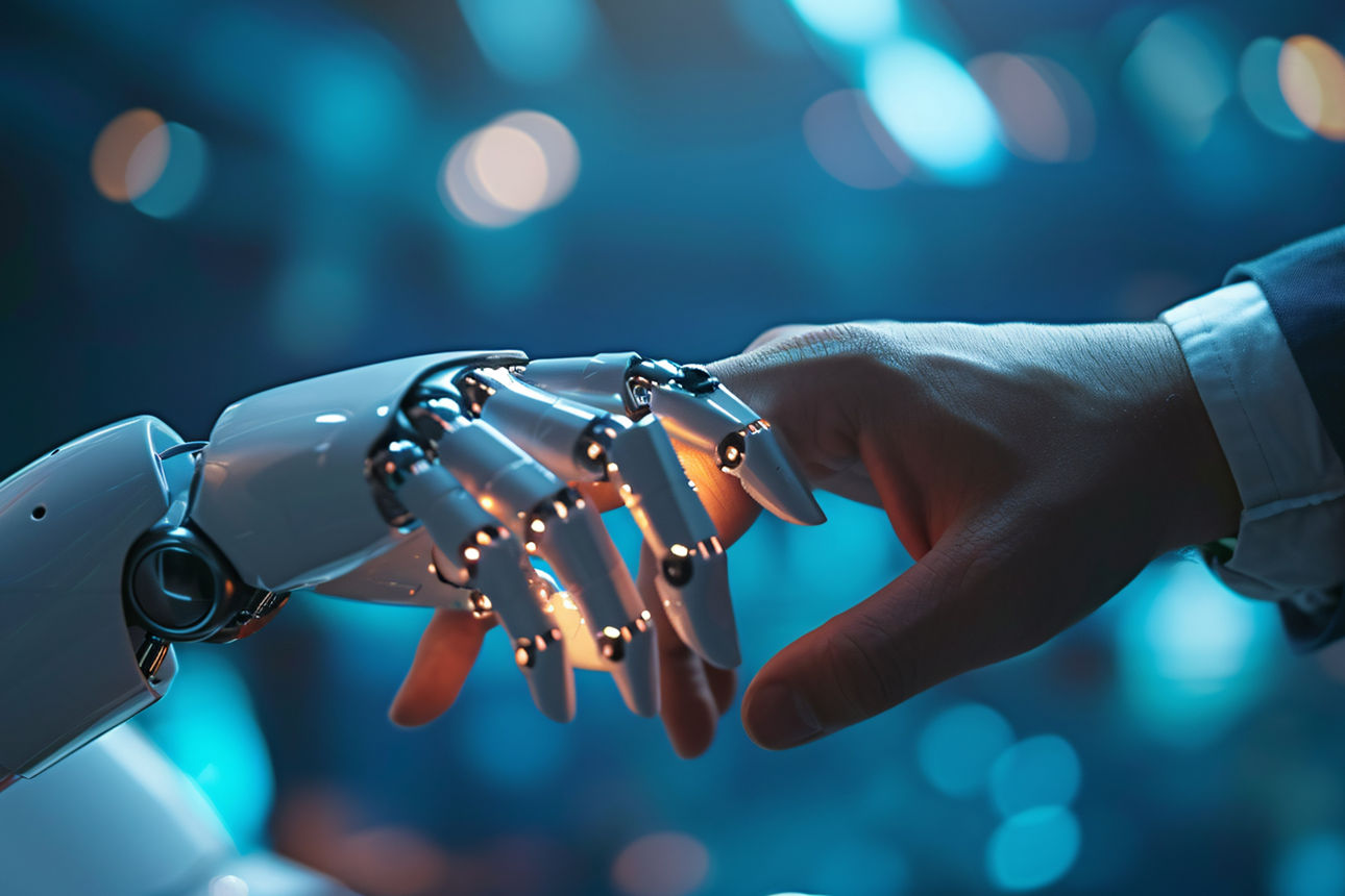 Eine Roboterhand berührt eine menschliche Hand
