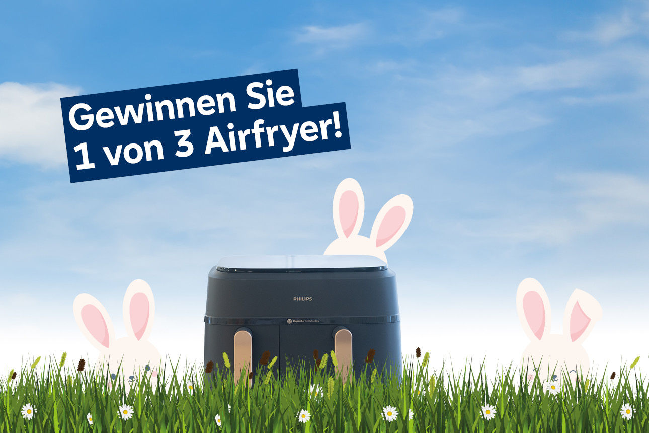 Bild eines Airfryers auf einer gezeichneten Wiese mit Osterhasen - Infotext "Gewinnen Sie 1 von 3 Airfryern!"