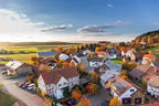 Ein idyllisches Dorf aus der Vogelperspektive. Ein idyllisches Dorf aus der Vogelperspektive.