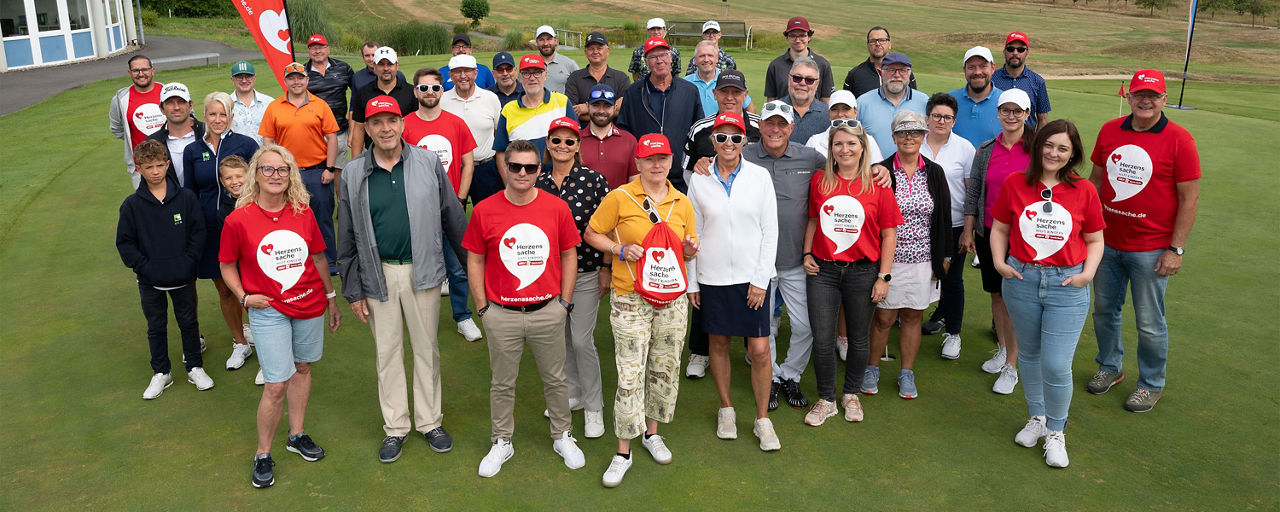 Gruppenbild auf einem Golfplatz