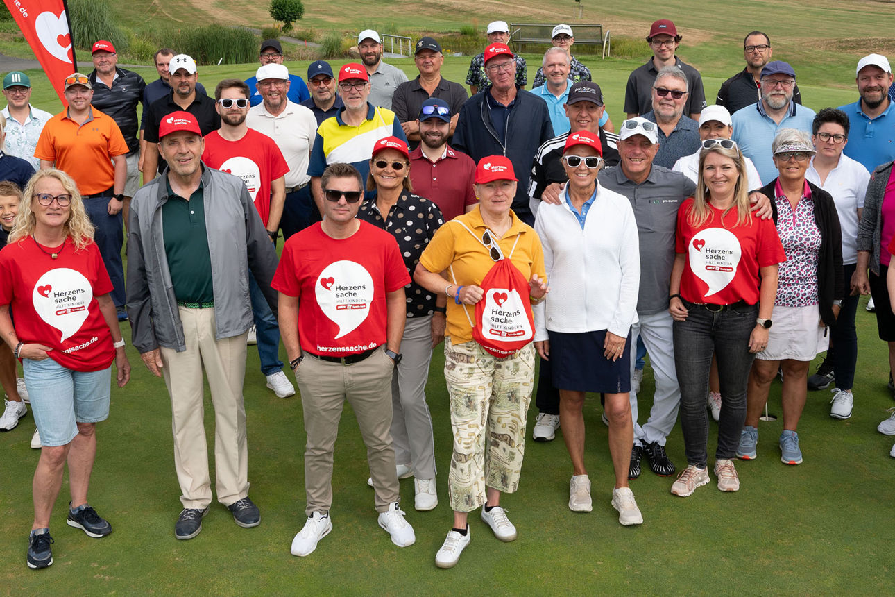 Gruppenbild auf einem Golfplatz