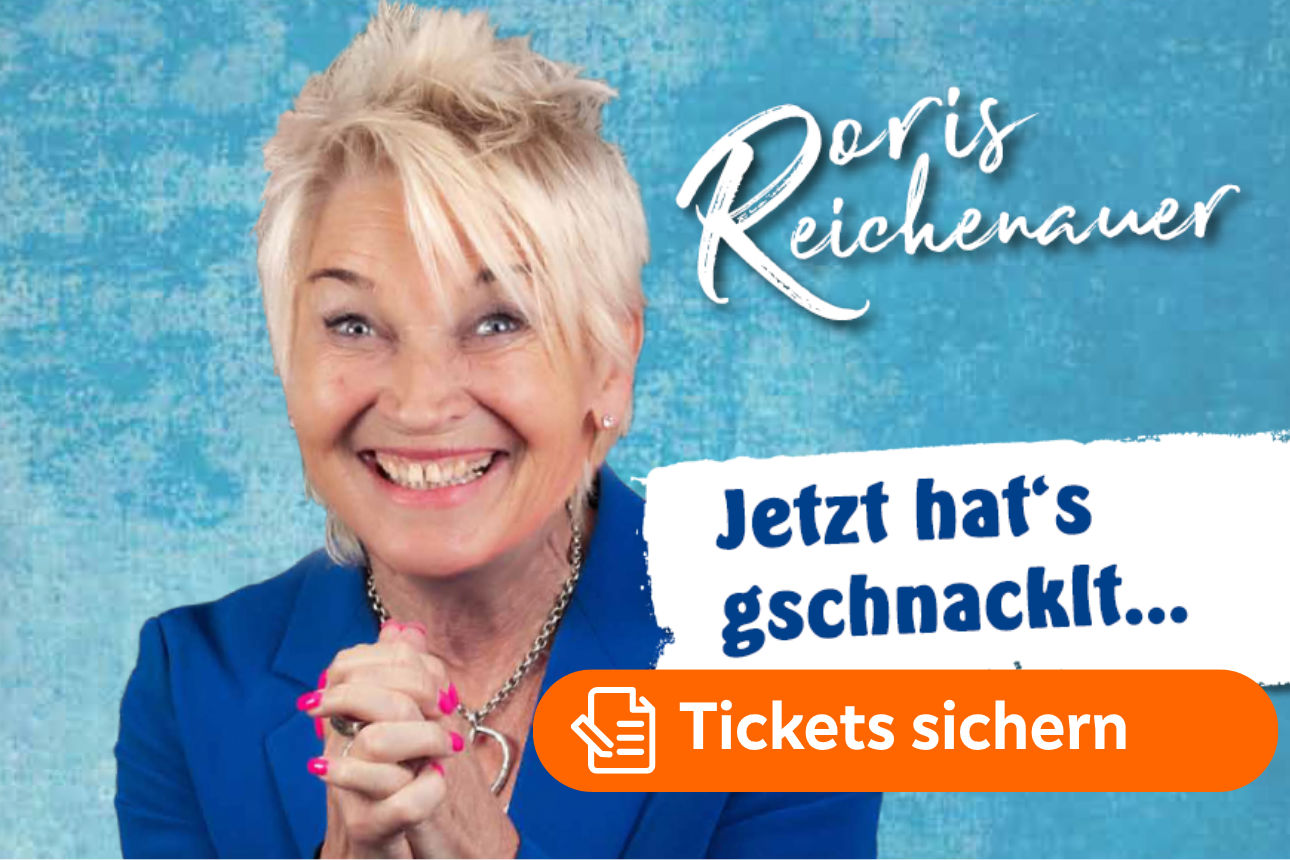 Person im blauen Blazer vor türkisfarbenem Hintergrund mit dem Schriftzug „Jetzt hat's gschnacklt...“.