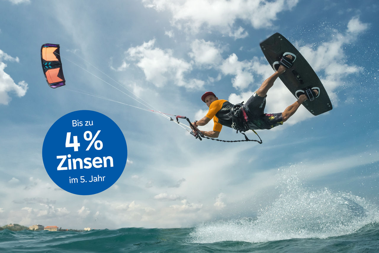 Surfer fliegt hoch hinauf - dank Wachsstumssparen