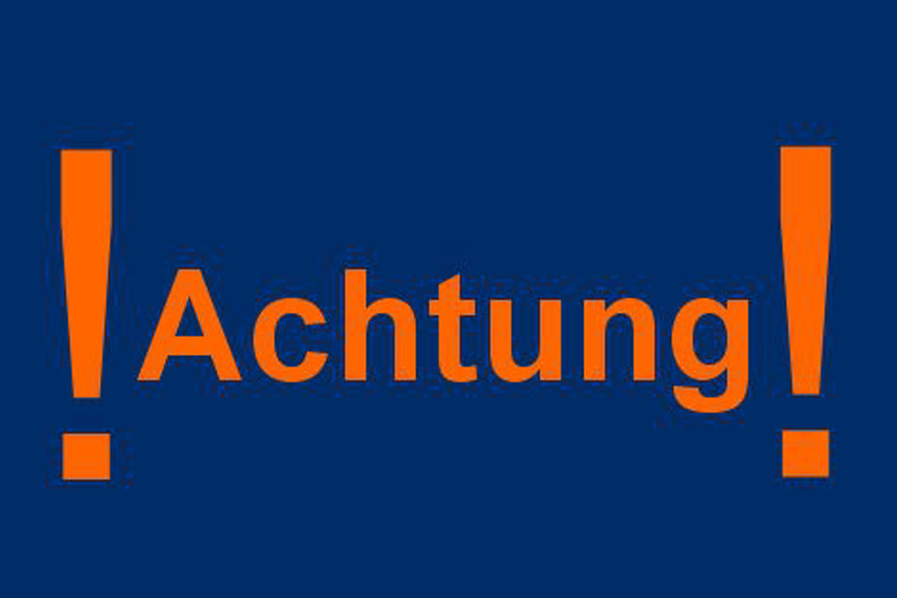 Text "Achtung" auf blauem Hintergrund