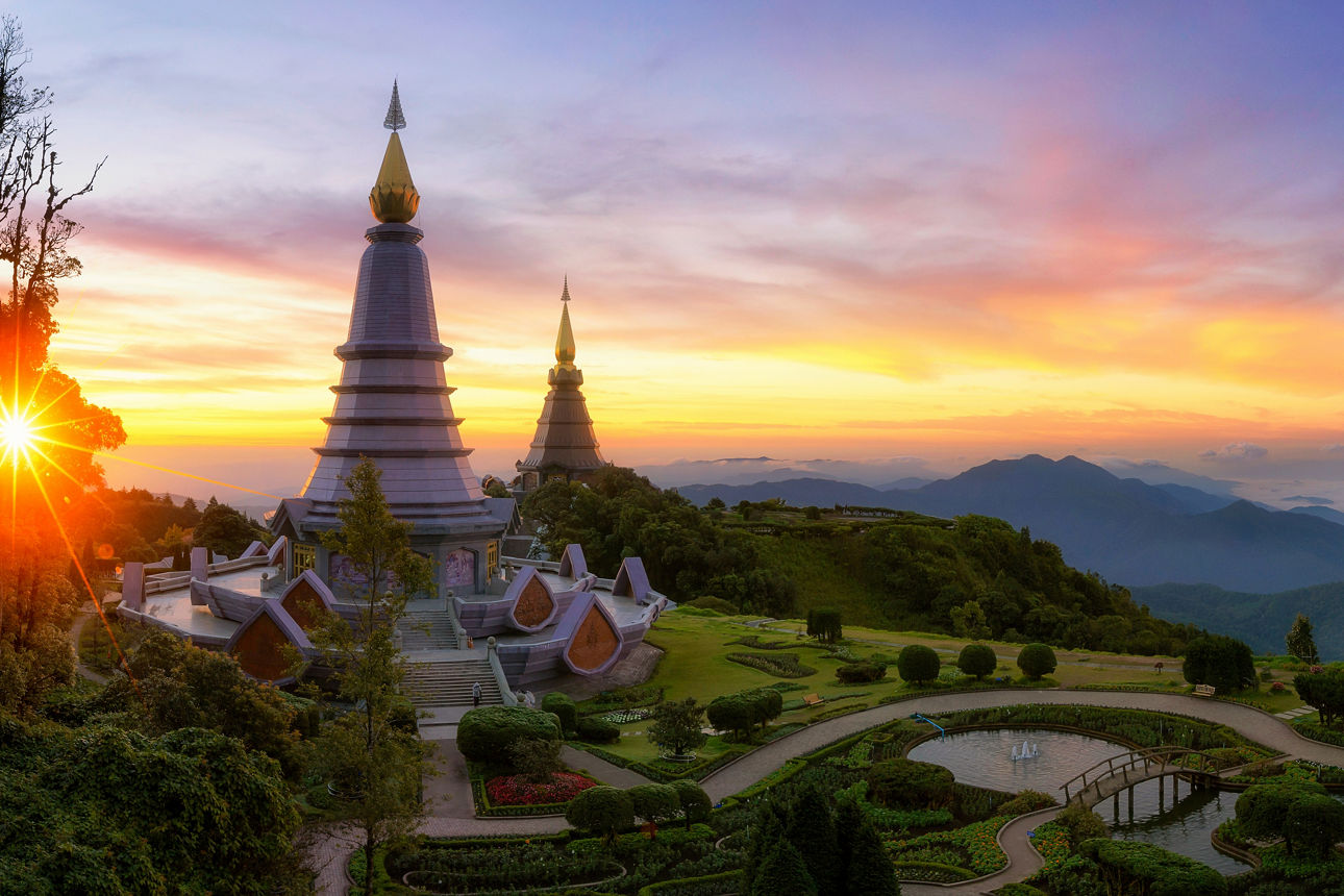 Landmark twin pagoda in doi Inthanon national park with sunrise and morning mist at Chiang mai, Thailand.