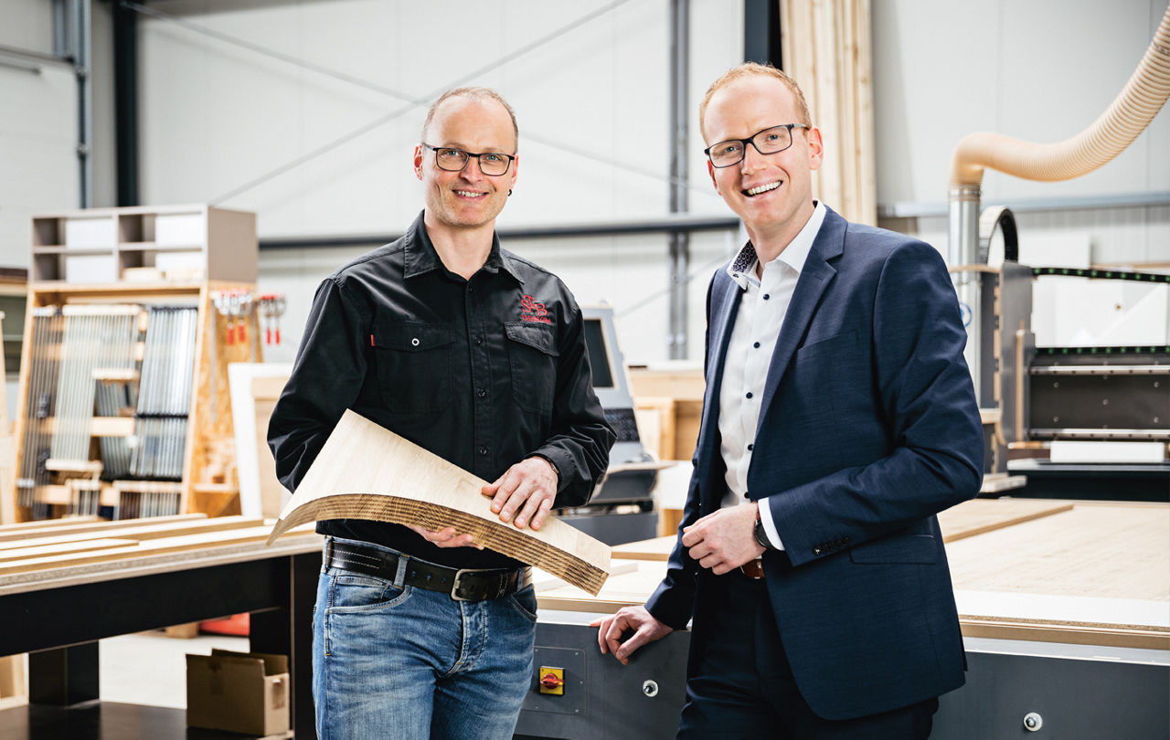Firmenkunde und Firmenkundenberater im Gespräch