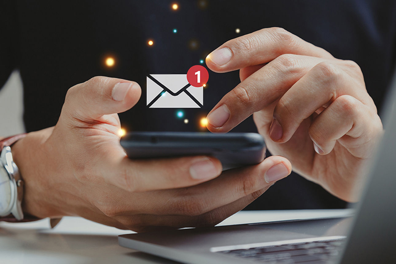 Hand of businessman using smartphone for email with notification alert, Online communication concept.