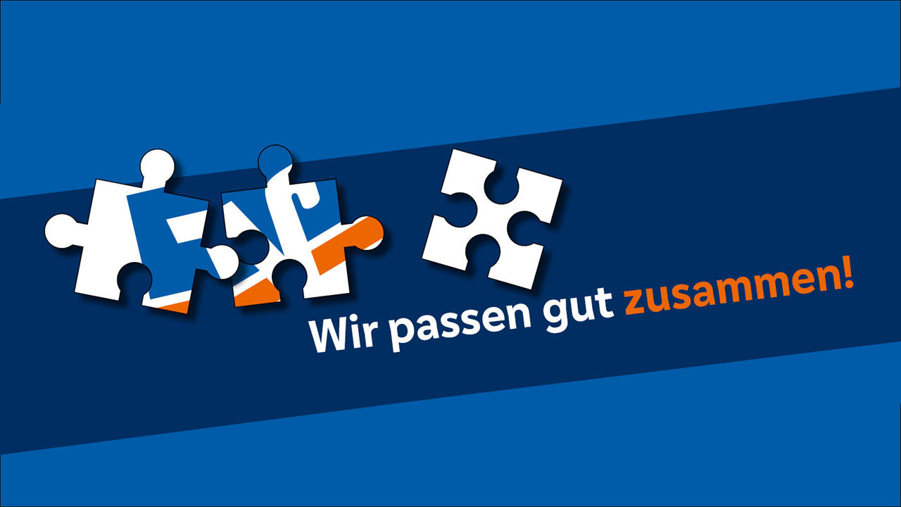 Das Bild enthält Puzzleteile, die den Schriftzug "VR" darstellen und die Aufschrift "Wir passen gut zusammen".