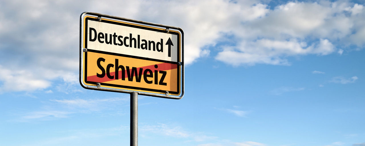 Ortschild mit der Aufschift Schweiz und Deutschland