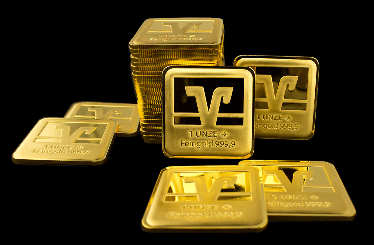 Eine Sammlung von Goldbarren, jeder gestempelt mit „1 UNZE Feingold 999,9“ und einem stilisierten „V“.