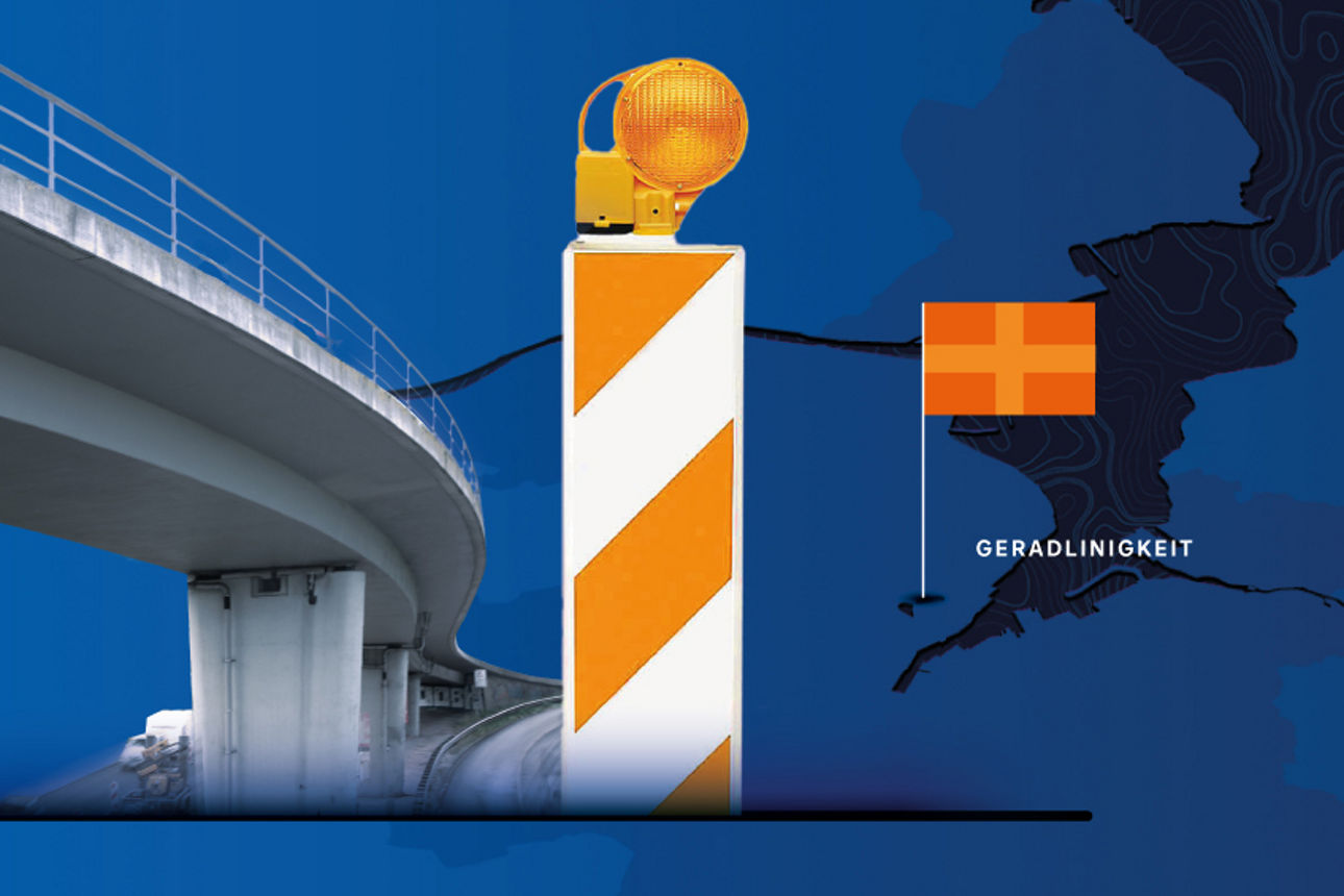 Warnaufsteller mit Leuchte vor einer Brücke