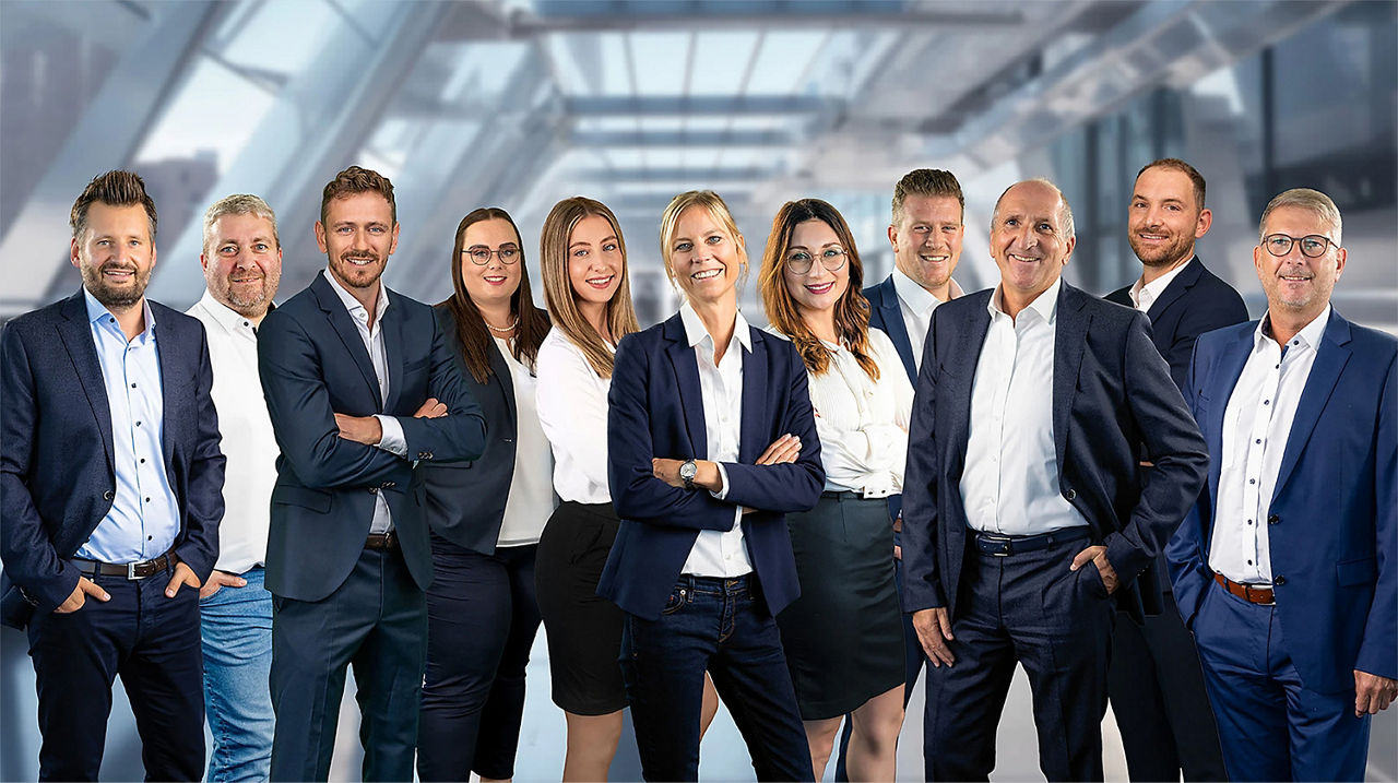 Gruppenfoto vom Team der VR-ImmoService Mainfranken GmbH