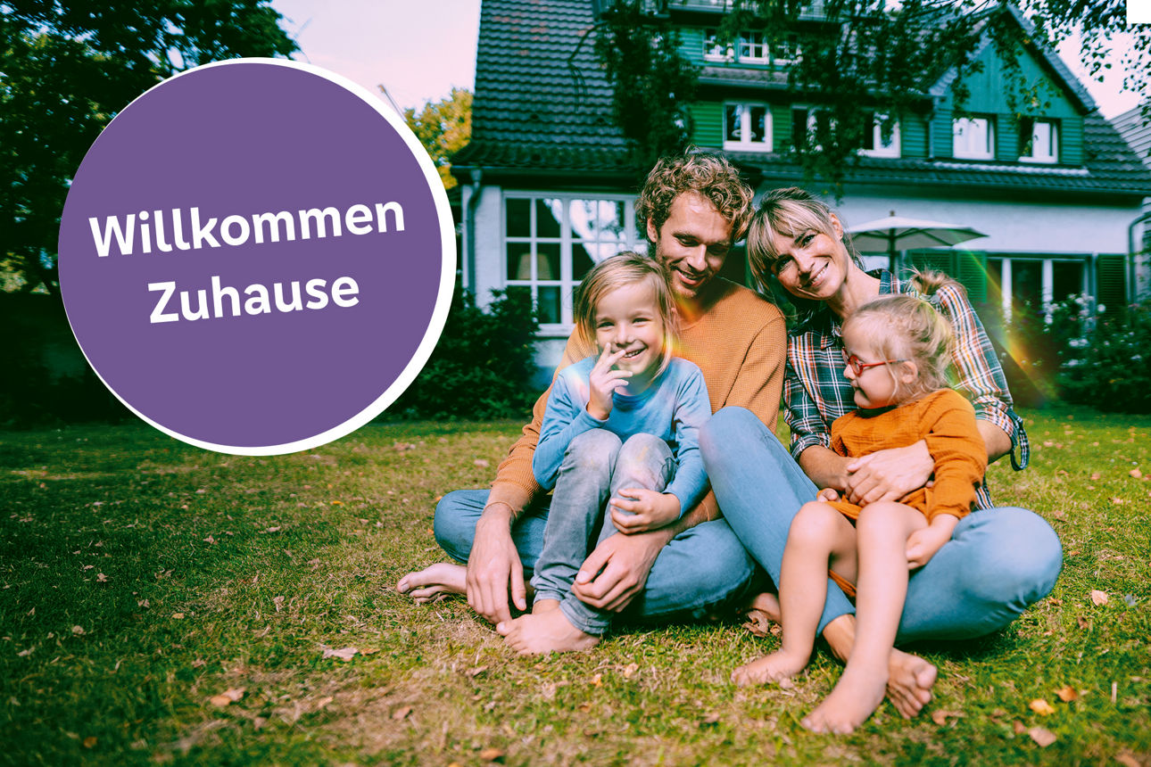 Smiling parents with children in front yard